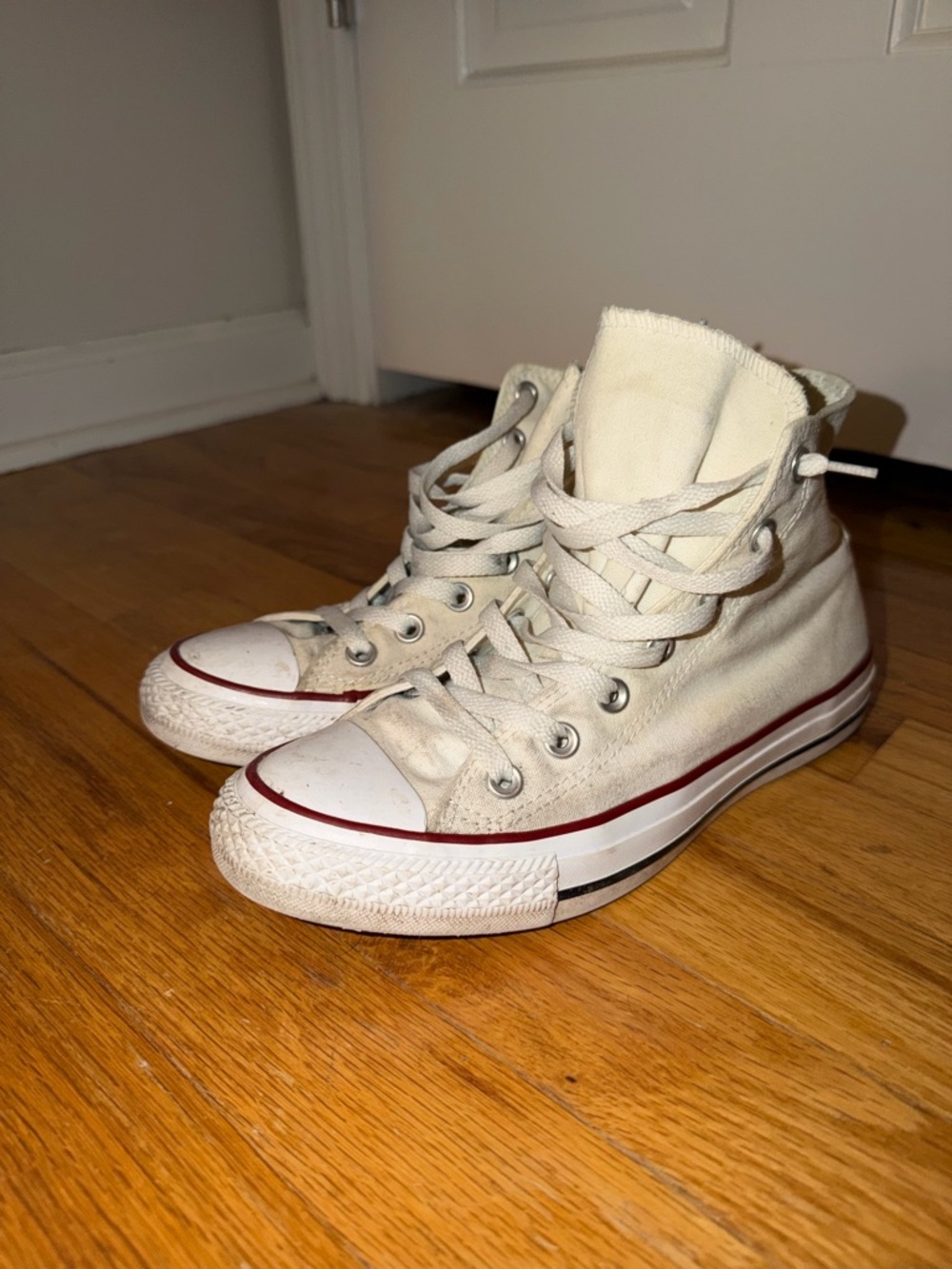 Converse Chuck Taylor High-Top Canvas Sneakers in White with red and blue accent